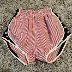 Lauren James red, white and blue shorts.